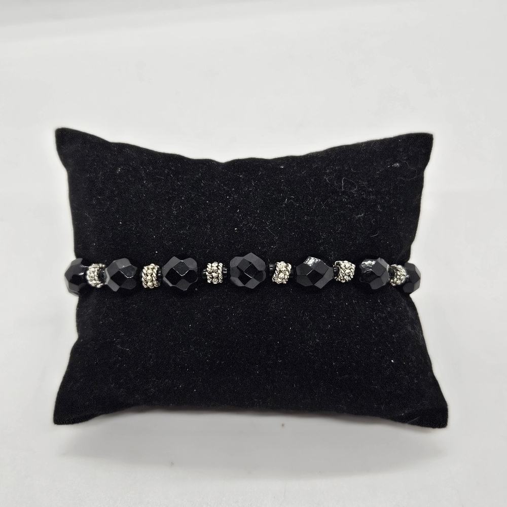 black and silver tone beaded bracelet with toggle clasp